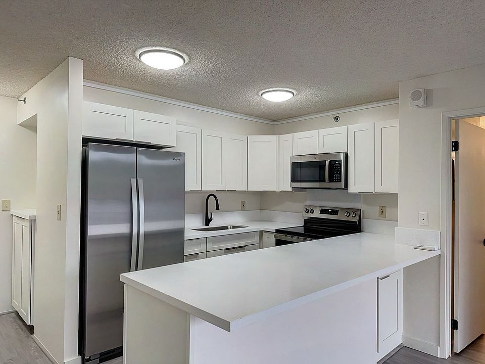 New cabinets, counters, and kitchen appliances