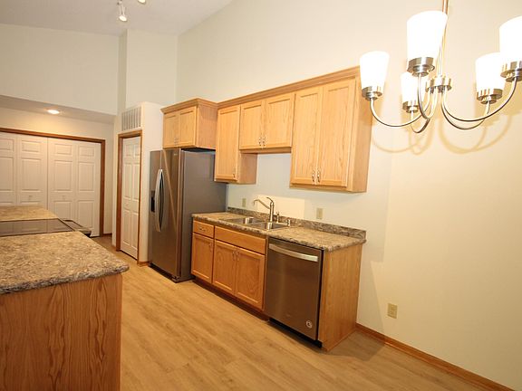 Custom cabinetry and countertops. Crown molding. Easy close doors.