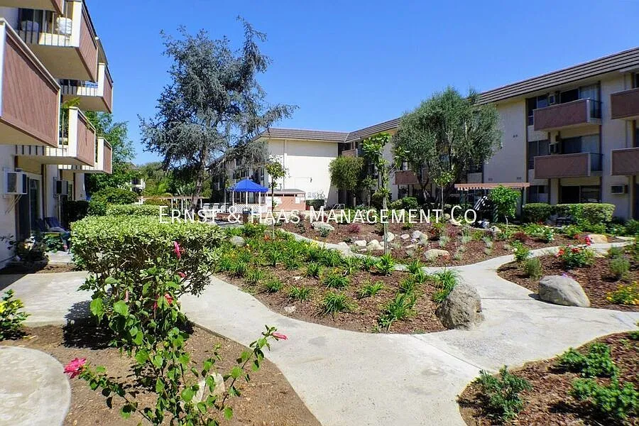 Beautifully Remodeled Top-Floor 1 Bedroom Condo with Resort-Style Amenities! — Photo 1