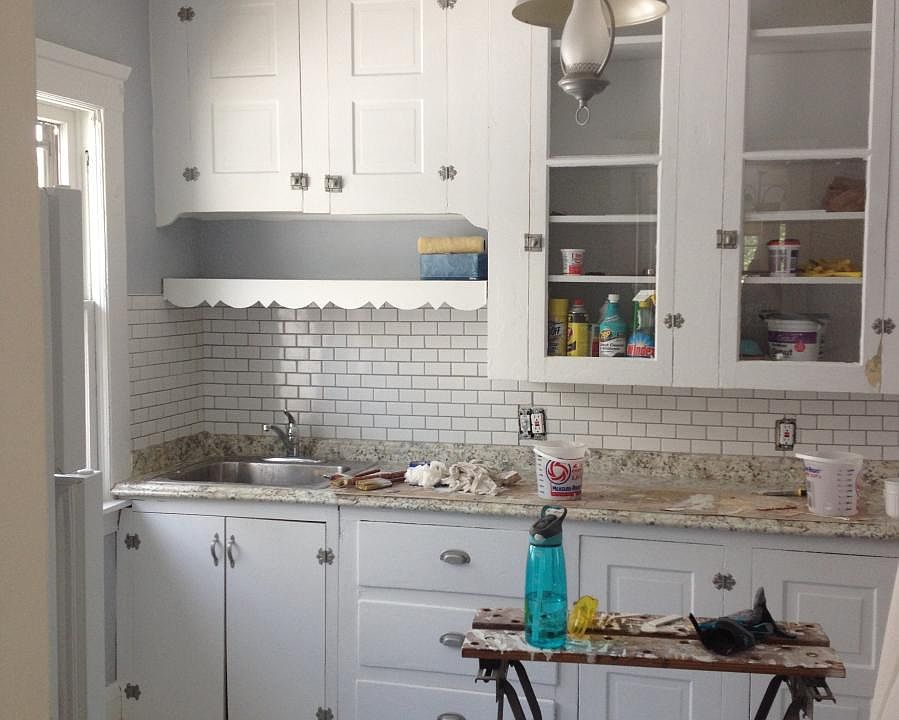 beautifully updated kitchen with original cabinets