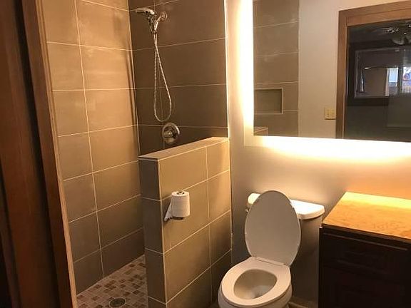 Completly remodeled bathroom with high end features and exqu