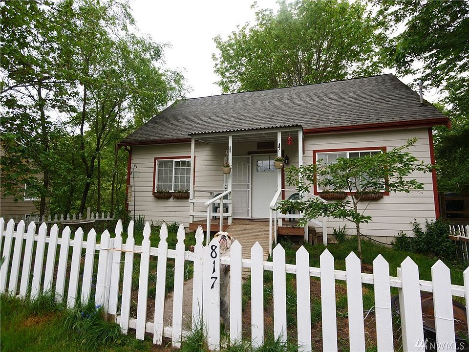 Charming setting, fully enclosed front yard with picket fence. Ramp to front door can be changed back to stairs upon request.