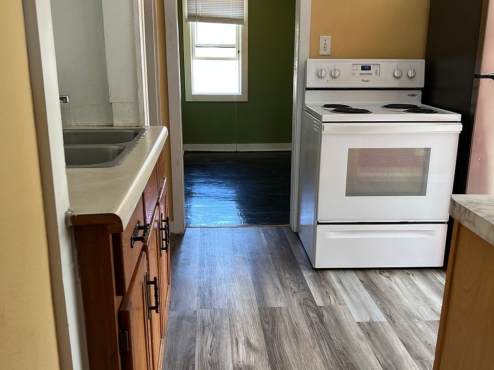 Kitchen with updated energy-efficient fridge