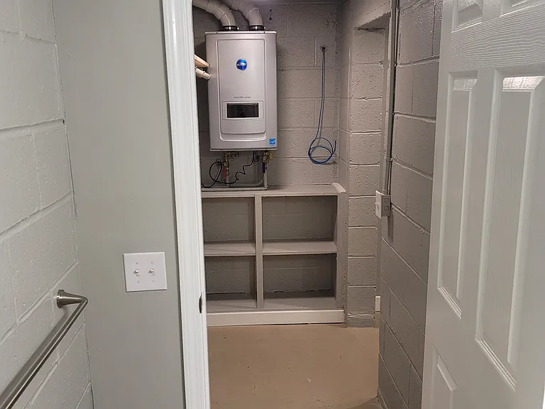 View from 2nd bathroom to hallway to 2nd bedroom