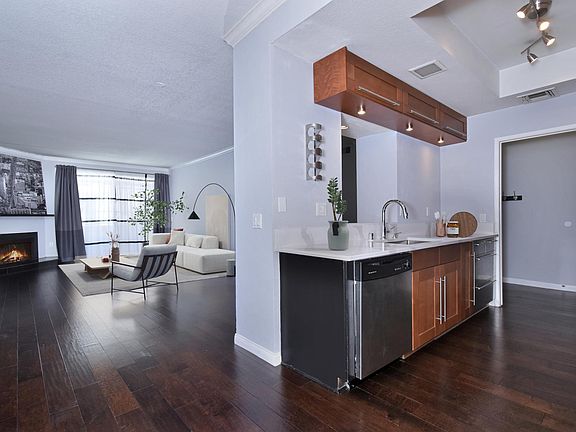 Kitchen & Living room view (with virtual staging)