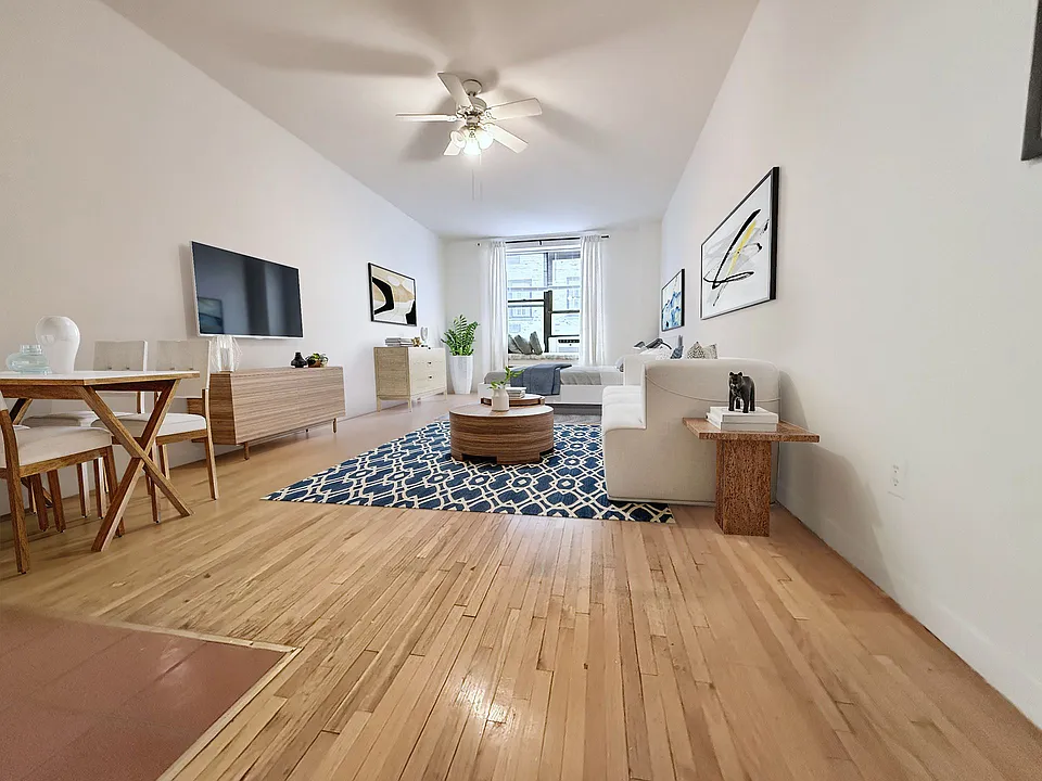 117 W 58th St #7D