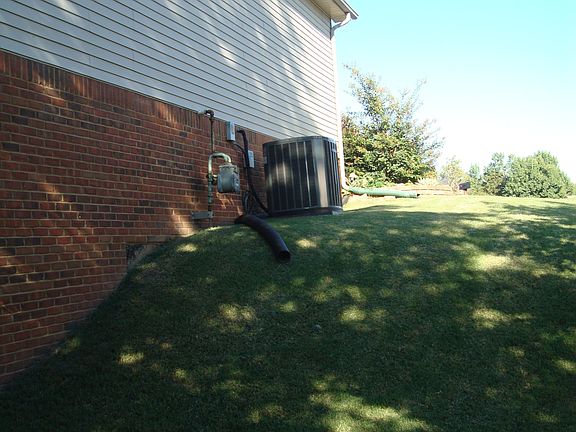 L side of house from back