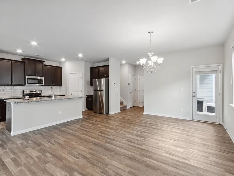 Living room facing kitchen