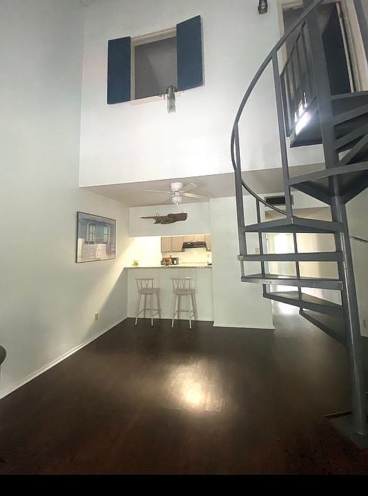 Living room with spiral stai