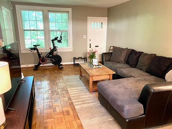 Large living room with hardwood floors.