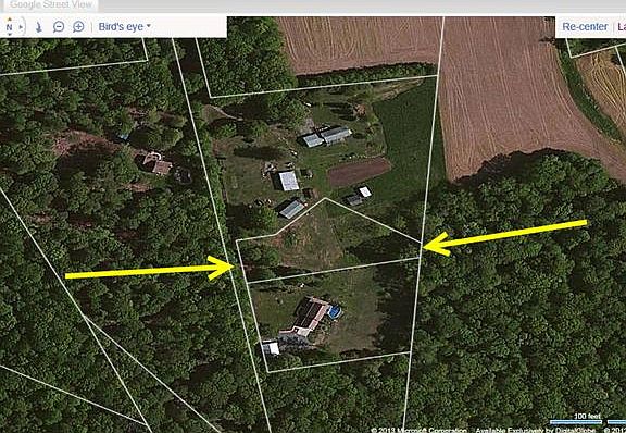 Middle lot, stakes marked w/orange