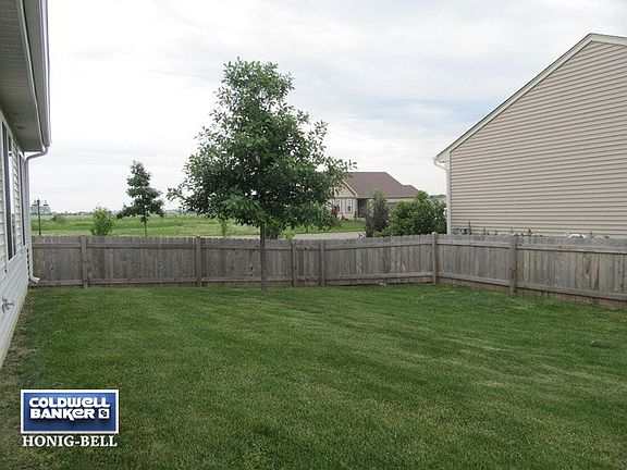 Newer backyard fence awaits you!