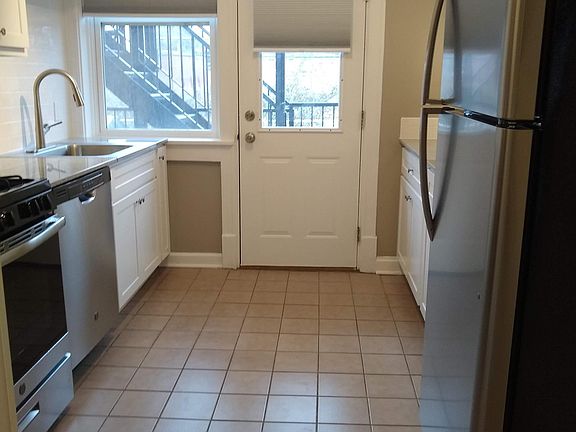 Very functional kitchen off the breakfast nook area and next to in-unit washer/dryer.