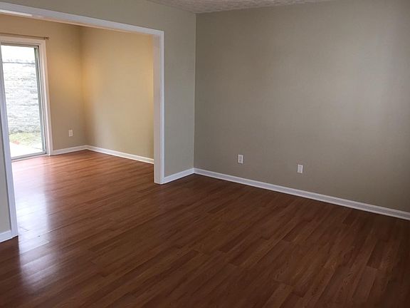 Living room and dine-in kitchen area