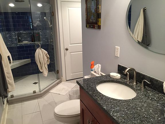 Bathroom, walk in shower and laundry (in closet)