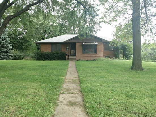 Front of home in summer