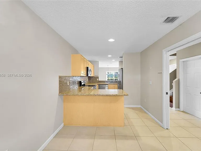 9840 NW 19th Pl — Photo 2
