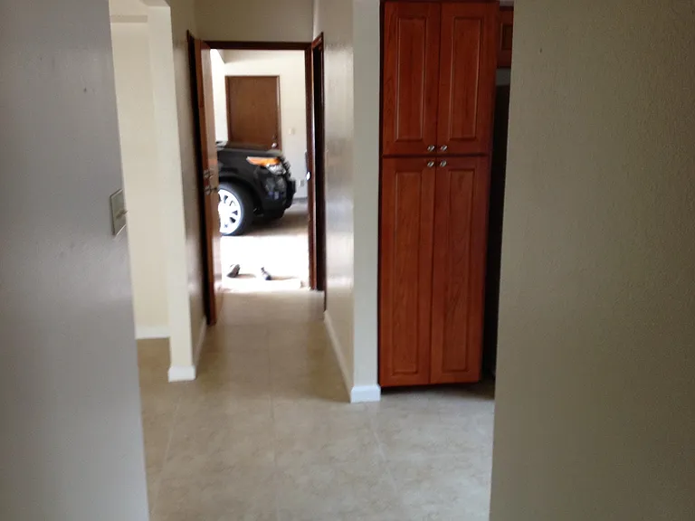 View from bedroom entrance to garage entrance