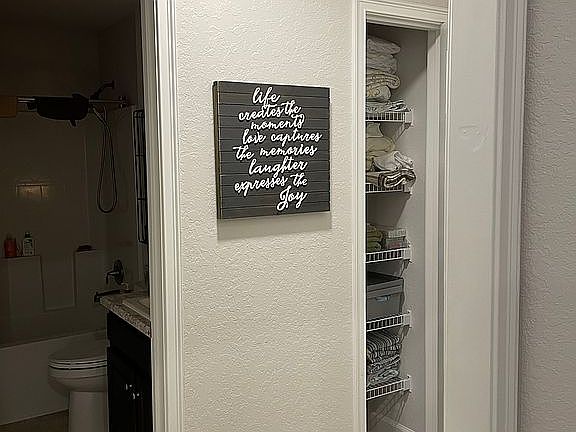 Full bath and linen closet