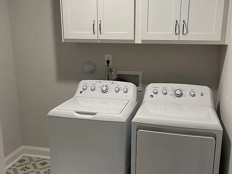 Large Laundry room with New washer and Dryer