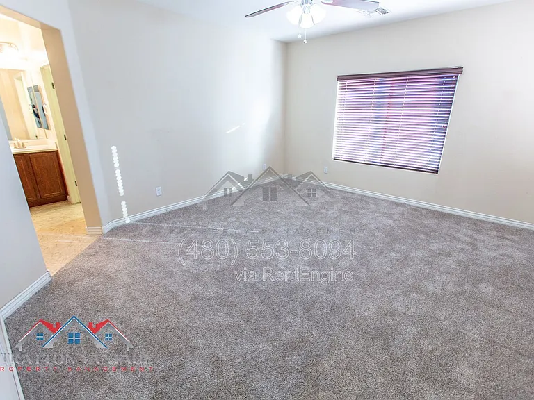 11751 W Daley Ln — Photo 30