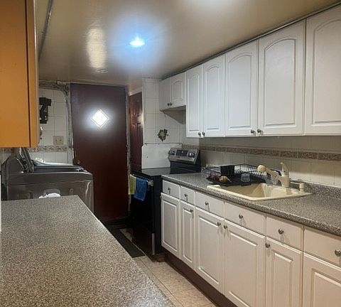 3rd image of 1707 E 172nd St #Basement