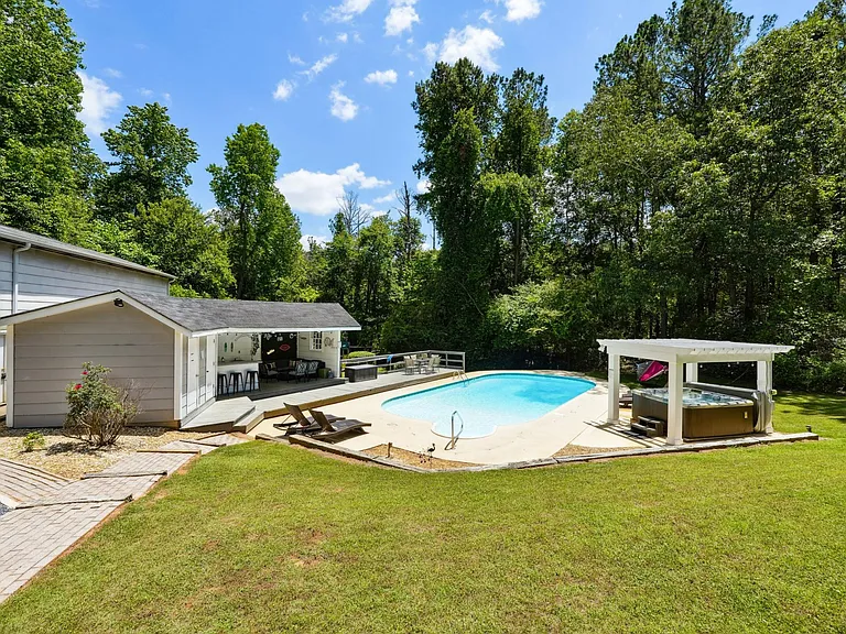 Pool ONLY OPEN May - September, HotTub open ALL YEAR. (Lounge chairs, pool bathroom, pool kitchen sink only usable/open in summer pool season)