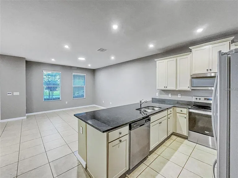 2424 Blowing Breeze Ave — Photo 8