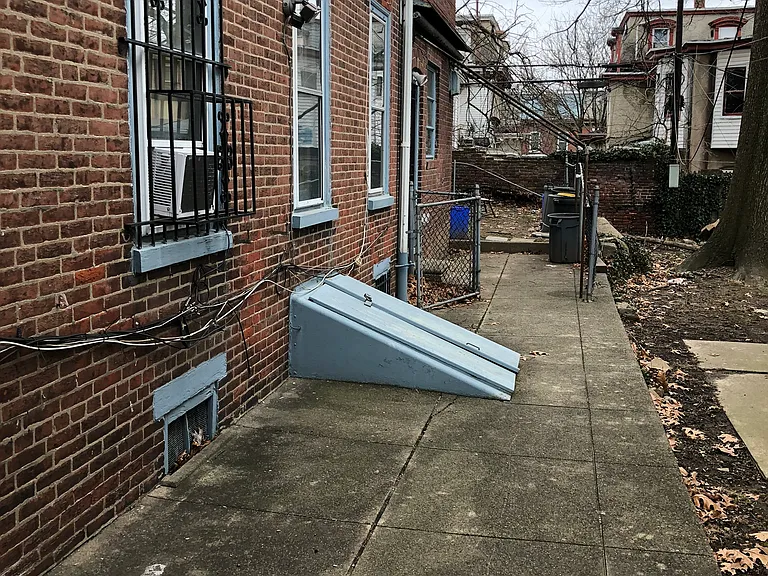 blue doors to laundry room and yard