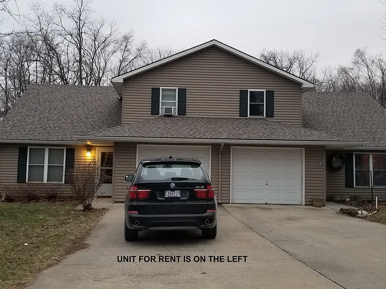 Unit is on the left. Includes one car garage with garage door opener.