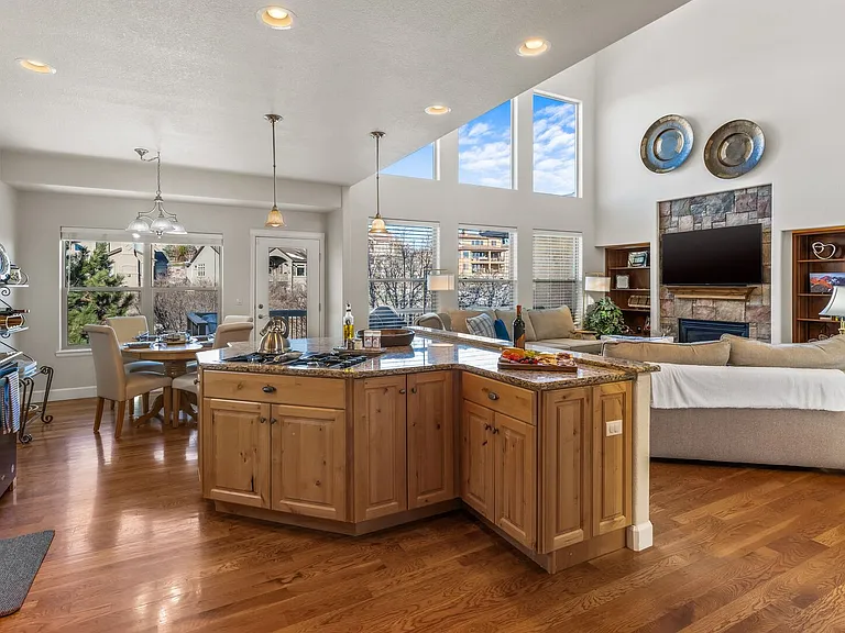 Open concept allows those in the kitchen to mingle with the family in the living room.