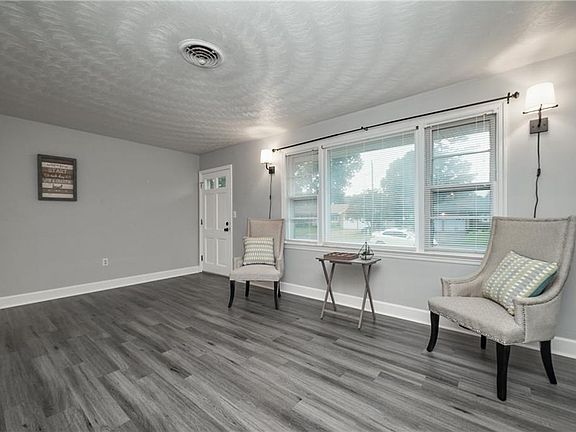 Neutral colored family room awaiting your personal decor.