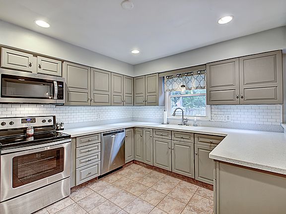 5th image of 5869 E 81st St