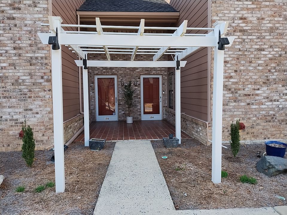 Shared entry. 106 Arbor Gate is on the left.