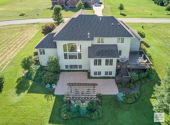 Amazing outdoor space~Enjoy entertaining & gorgeous sunsets on large deck & patio w/pergola!