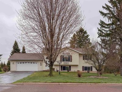 1407 DELMORE DRIVE, Merrill, WI, 54452