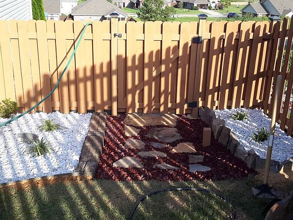 Walk path to neighbor, backyard