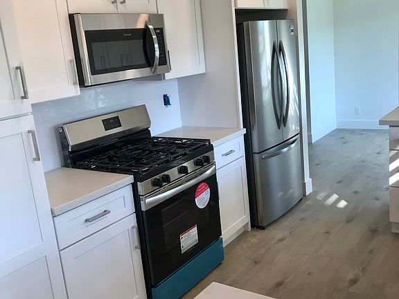 Completely remodeled kitchen 
Brand new cabinet depth refrigerator 
Along with all stainless steel appliances