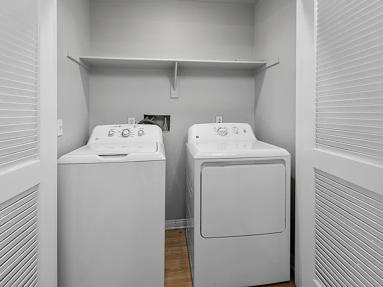 Simplify your routine with a washer and dryer inside your home.