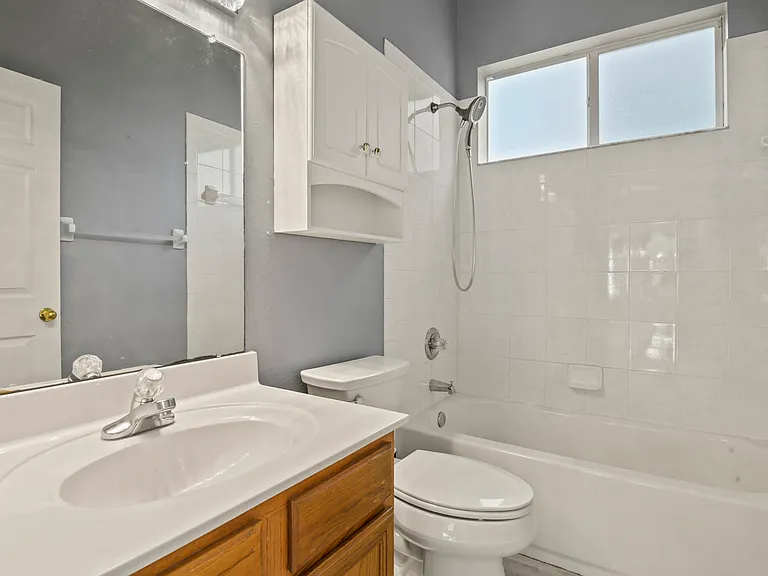 Bath - hall next to bedroom and access to back yard - for future pool bath