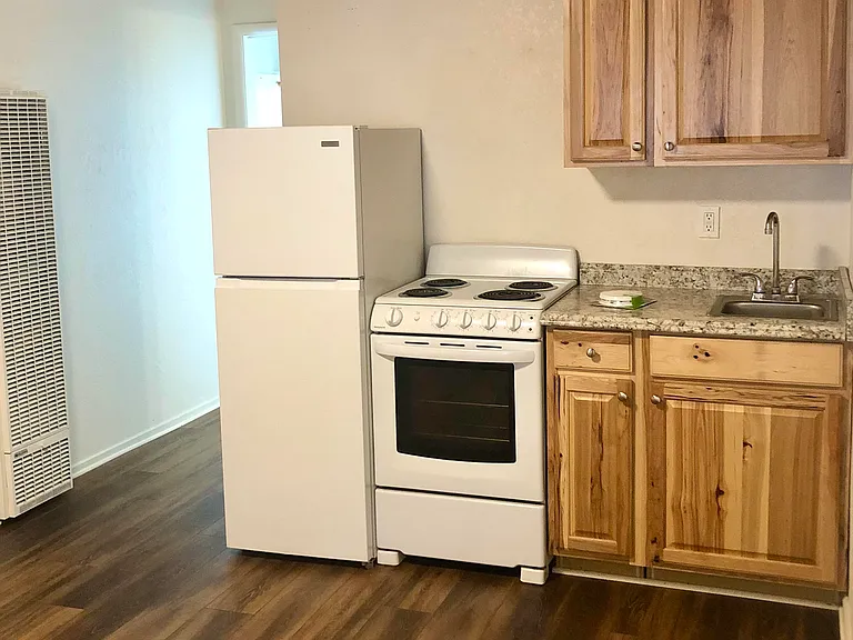 Nice kitchen! New granite counter and sink / faucet. Vintage ceilings