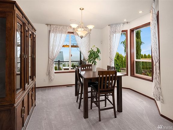 The dining room catches glimpses of the valley and is a fabulous place to entertain.