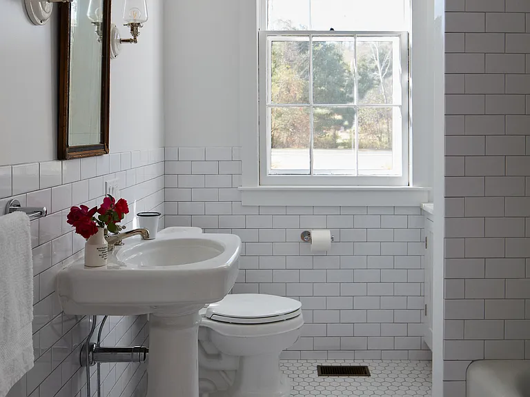 bathroom with heated floor and tub
