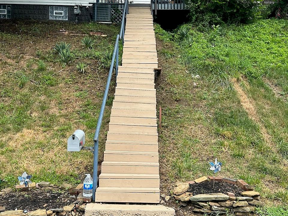 FRONT OF HOUSE/ NEW STEPS