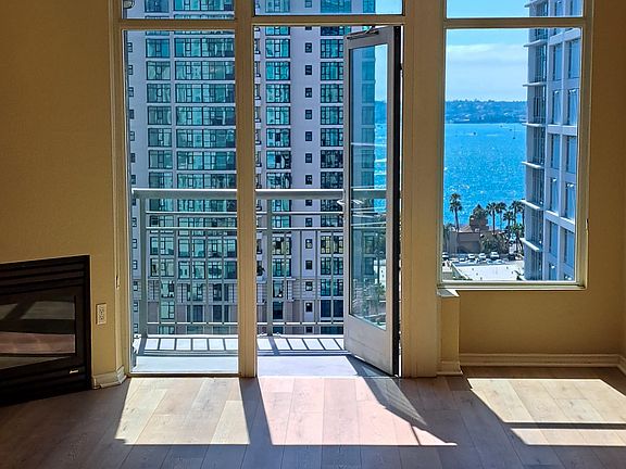 High-rise mornings. Sunset evenings.
Walk to Little Italy, Waterfront Park, and cafes.