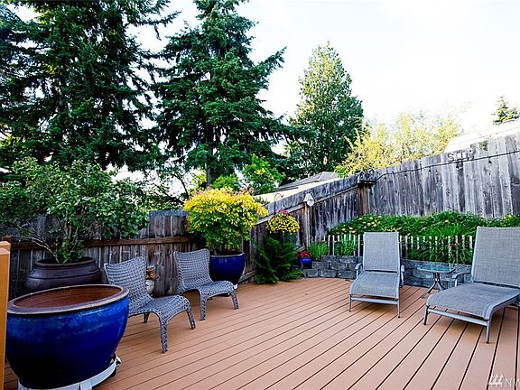 You will love spending time outside. Custom built cedar deck and beautiful landscaping will impress all of your guests. 