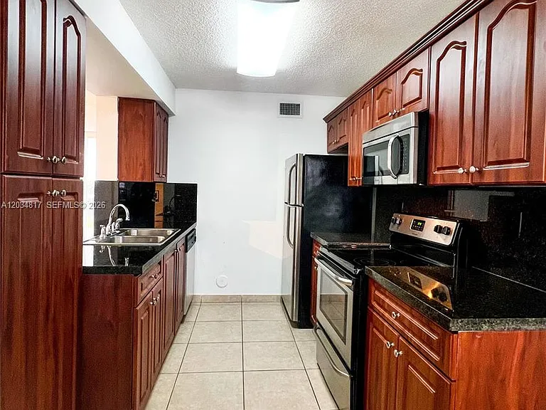 9767 NW 46th Ter #109 — Photo 3