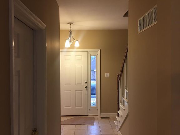 1/2 bath hall way to front door