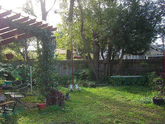 View of backyard past Gazebo