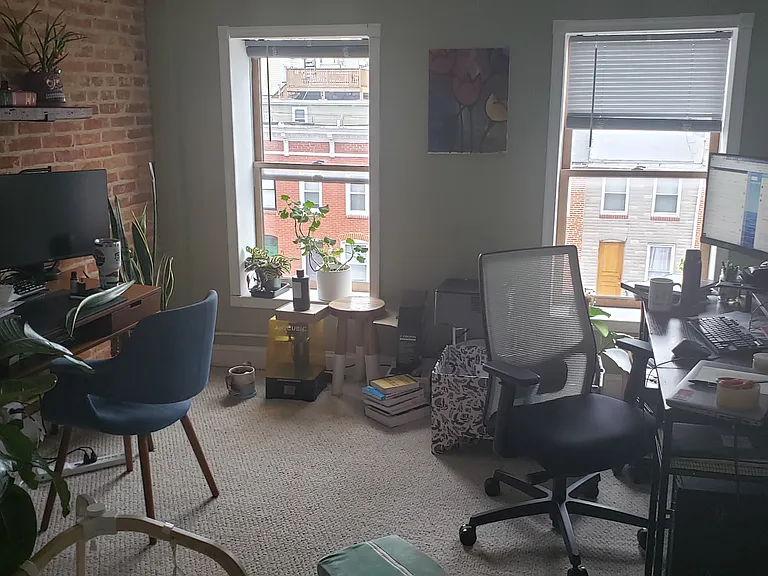 Third level bedroom (also used as a study) looking out the front windows.